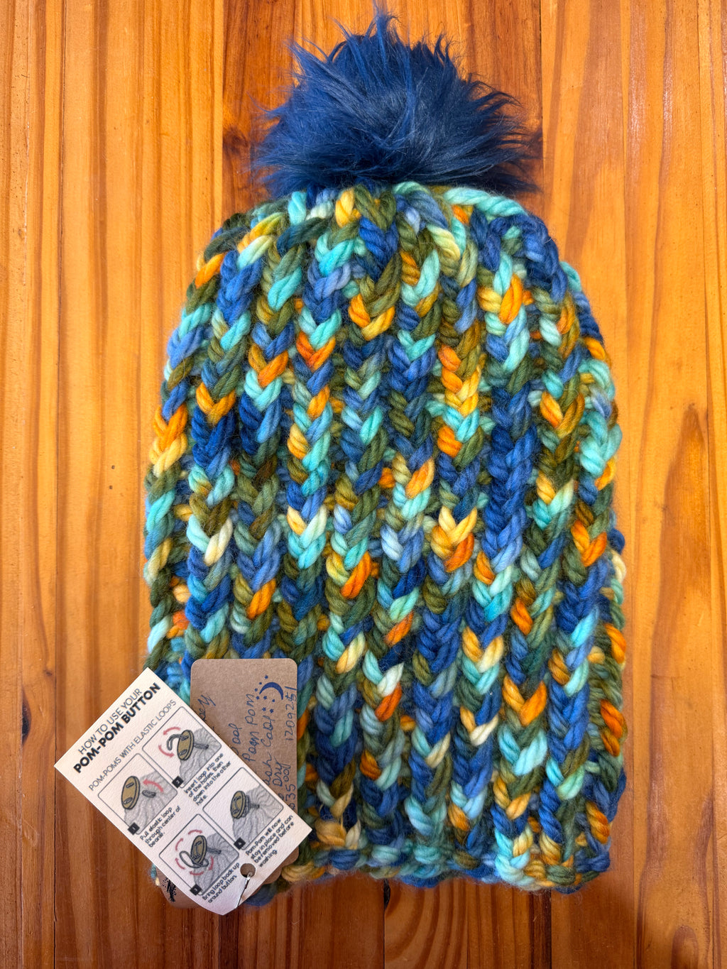 Chunky Monkey Pom Pom Hand Knit Hat-Greens, Blues & Golds/Navy Blue Pom-Pom