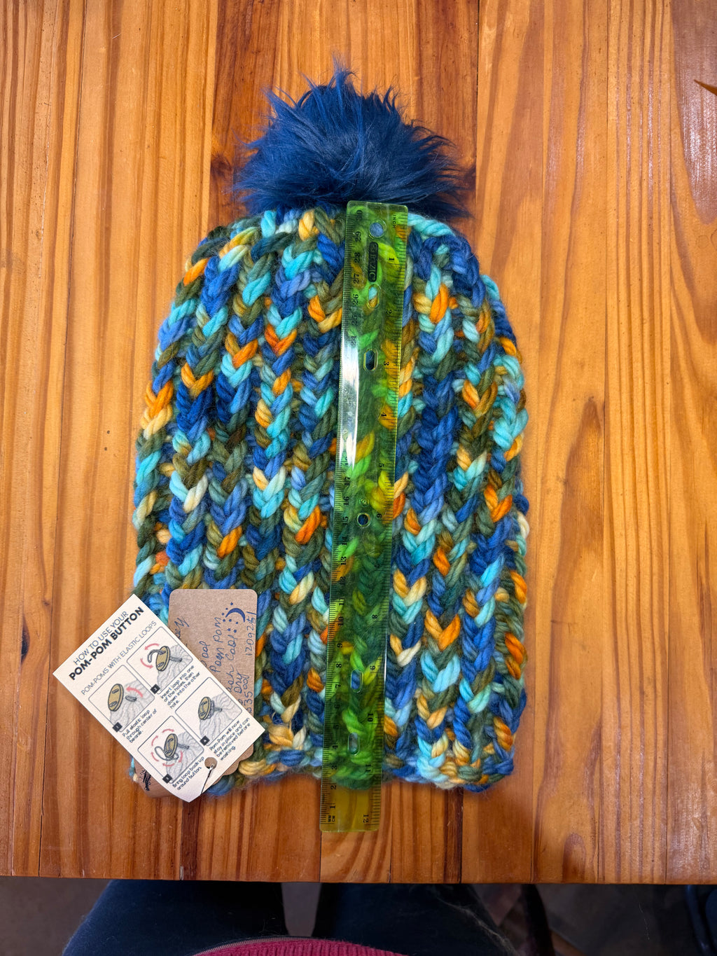 Chunky Monkey Pom Pom Hand Knit Hat-Greens, Blues & Golds/Navy Blue Pom-Pom